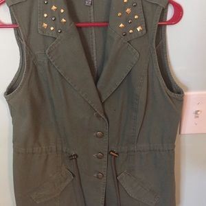 Green vest with gold decorations